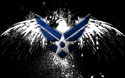 HD desktop wallpaper featuring a dynamic Air Force logo with an eagle in the background, highlighted against a dramatic black and white splattered backdrop.