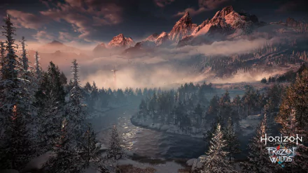 HD PC desktop wallpaper featuring a snowy mountainous landscape from Horizon Zero Dawn: The Frozen Wilds video game, showcasing misty forests and dramatic skies.