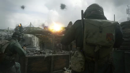 HD desktop wallpaper featuring intense action from Call of Duty: WWII, showcasing soldiers in combat with explosions and gunfire.