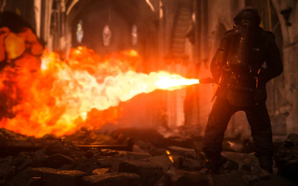 HD wallpaper of Call of Duty: WWII featuring a soldier in action with a flamethrower, set in a fiery, war-torn scene inside a decaying building.