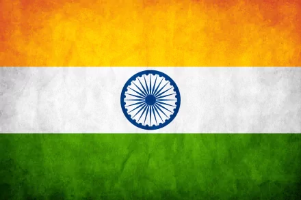 HD PC desktop wallpaper featuring the Indian flag with its saffron, white, and green stripes and the blue Ashoka Chakra in the center.