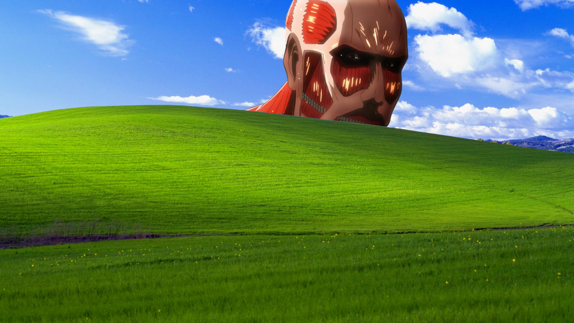 Colossal Titan shows up in the Windows XP wallpaper