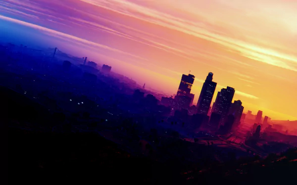 A vivid HD Grand Theft Auto V wallpaper showing a biker on a bike overlooking the Los Santos city skyline at sunset with skyscrapers under a colorful sky.