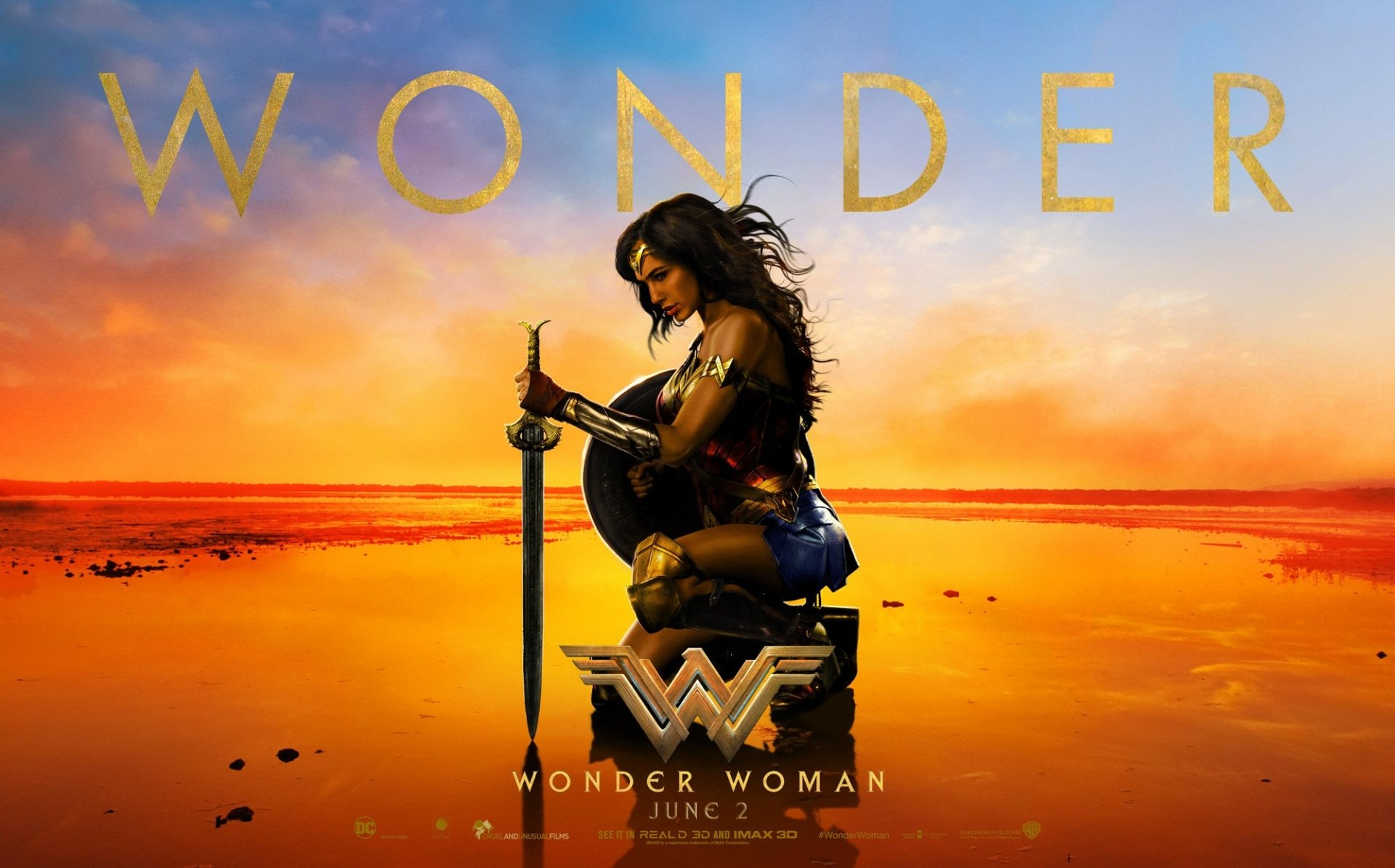 HD desktop wallpaper featuring Gal Gadot as Wonder Woman, kneeling with a sword against a sunset backdrop. The word Wonder is displayed prominently at the top.