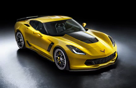 Yellow Chevrolet Corvette C7.R grand tourer race car showcased in 4K Ultra HD as a sleek, high-performance vehicle against a dark background.