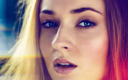 Close-up HD wallpaper of Sophie Turner, an English actress with red hair and blue eyes.