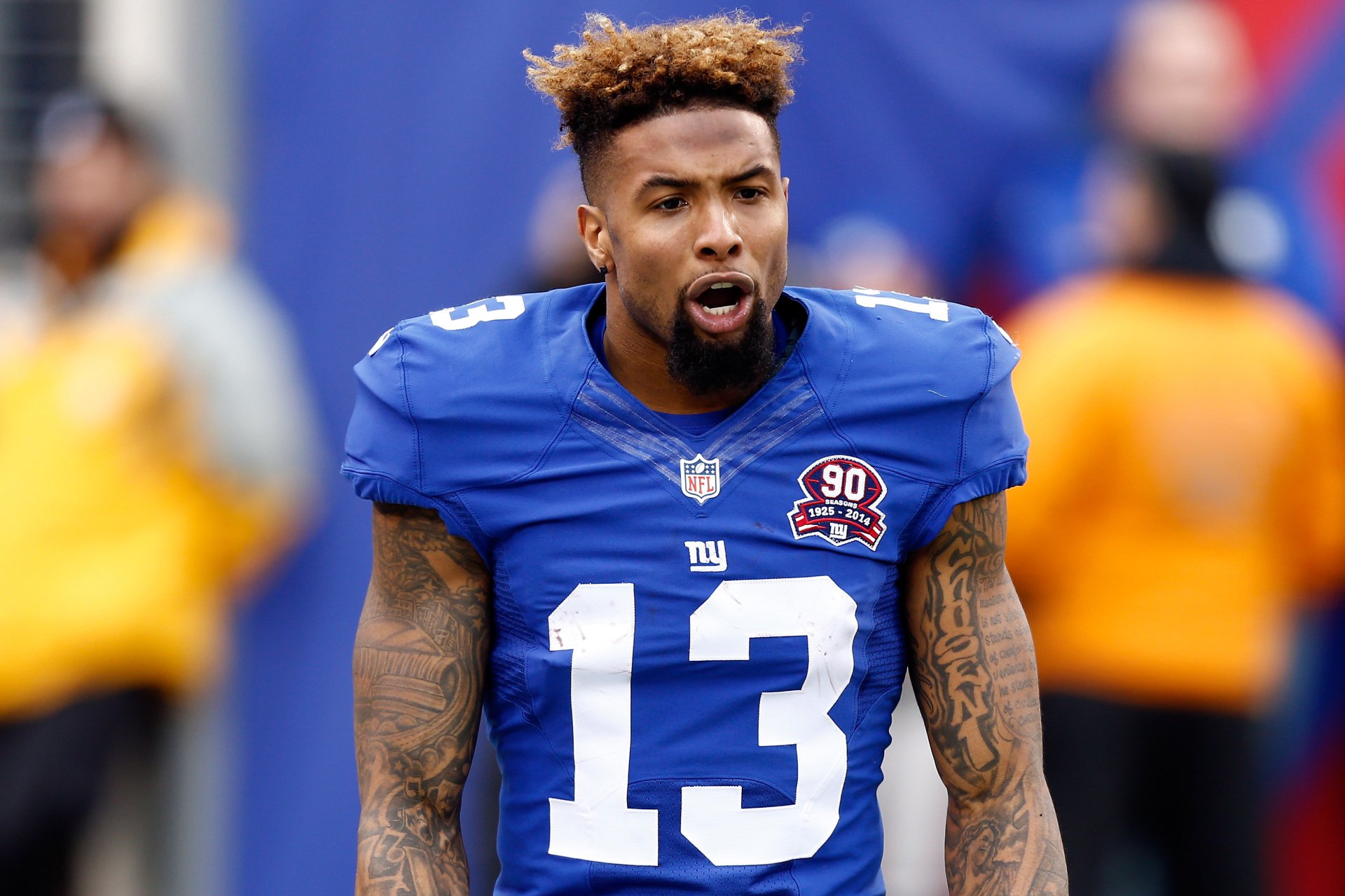 HD wallpaper of New York Giants player, wearing number 13, on the field.
