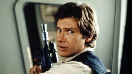 HD desktop wallpaper featuring Han Solo from the Star Wars movie, showcasing the iconic character in a striking pose with his blaster.