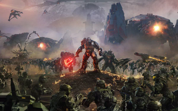 HD PC desktop wallpaper depicting an intense battle scene from the video game Halo Wars 2, featuring armored soldiers and futuristic war machines under a smoky sky.