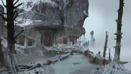 HD desktop wallpaper featuring a snowy, rugged landscape from the video game God of War (2018), showcasing an ancient, weathered entrance set into a rocky mountainside.