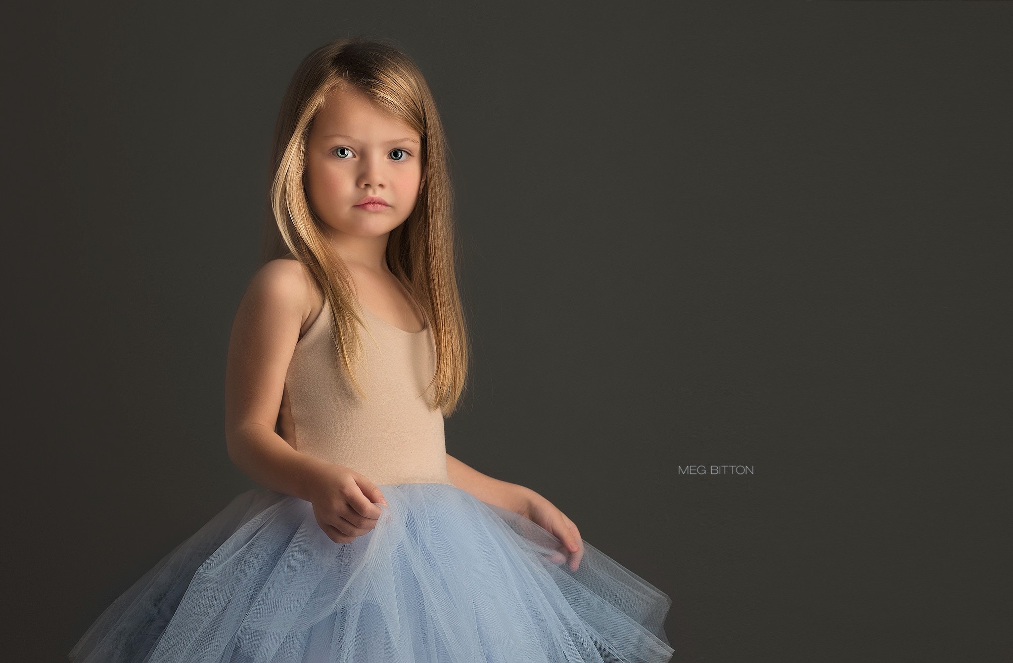 Little Girl Wearing Tutu by Meg Bitton