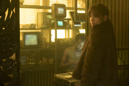 HD desktop wallpaper of Joi, played by Ana de Armas, from the movie Blade Runner 2049, featuring a moody, futuristic indoor scene.