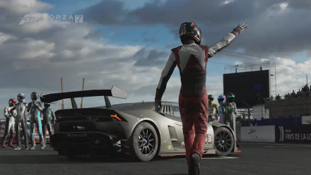 4K Ultra HD PC desktop wallpaper of a Lamborghini Huracan race car in the Forza Motorsport 7 video game — driver raises an arm beside the Lamborghini on the grid.