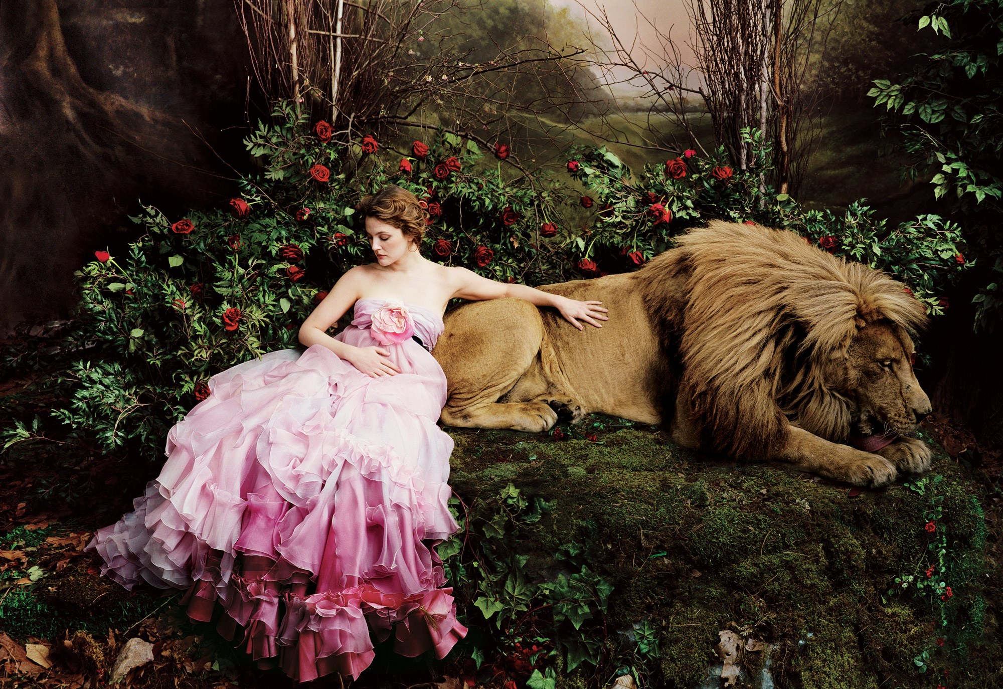 Woman with Lion in Forest by Annie Leibovitz