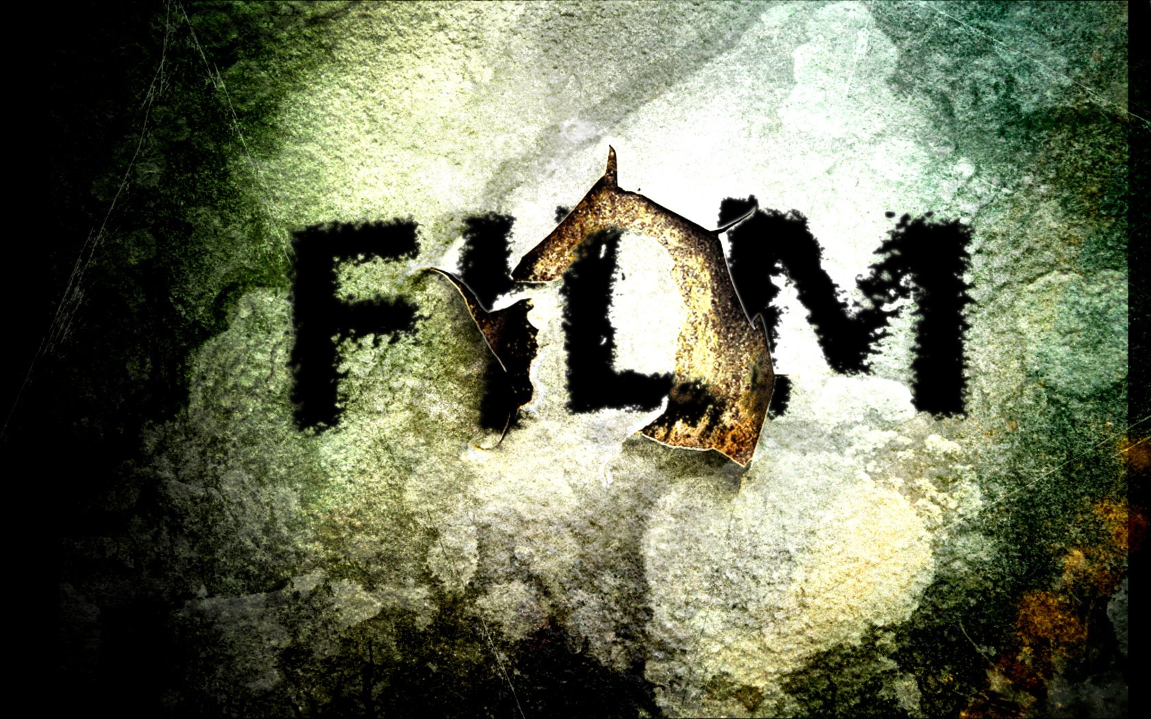 Artistic HD PC desktop wallpaper: grunge green-gray textured background with a glowing center and the torn-paper, paint-splattered word FILM across the middle.