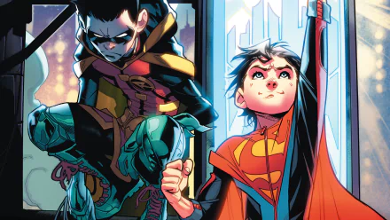 HD desktop wallpaper featuring Jon Kent (Superboy) and Damian Wayne (Robin) from the DC Comics series Super-Sons. A vibrant background showcases the camaraderie of these youthful heroes.
