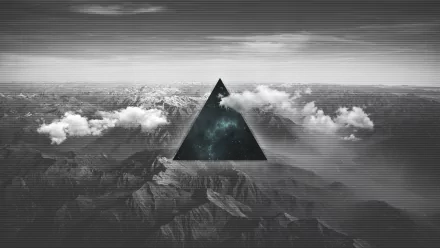 HD desktop wallpaper featuring an artistic mountain scene with glitch effects and a central triangle in a polyscape style. The monochromatic mountains and dramatic sky create a striking visual contrast.