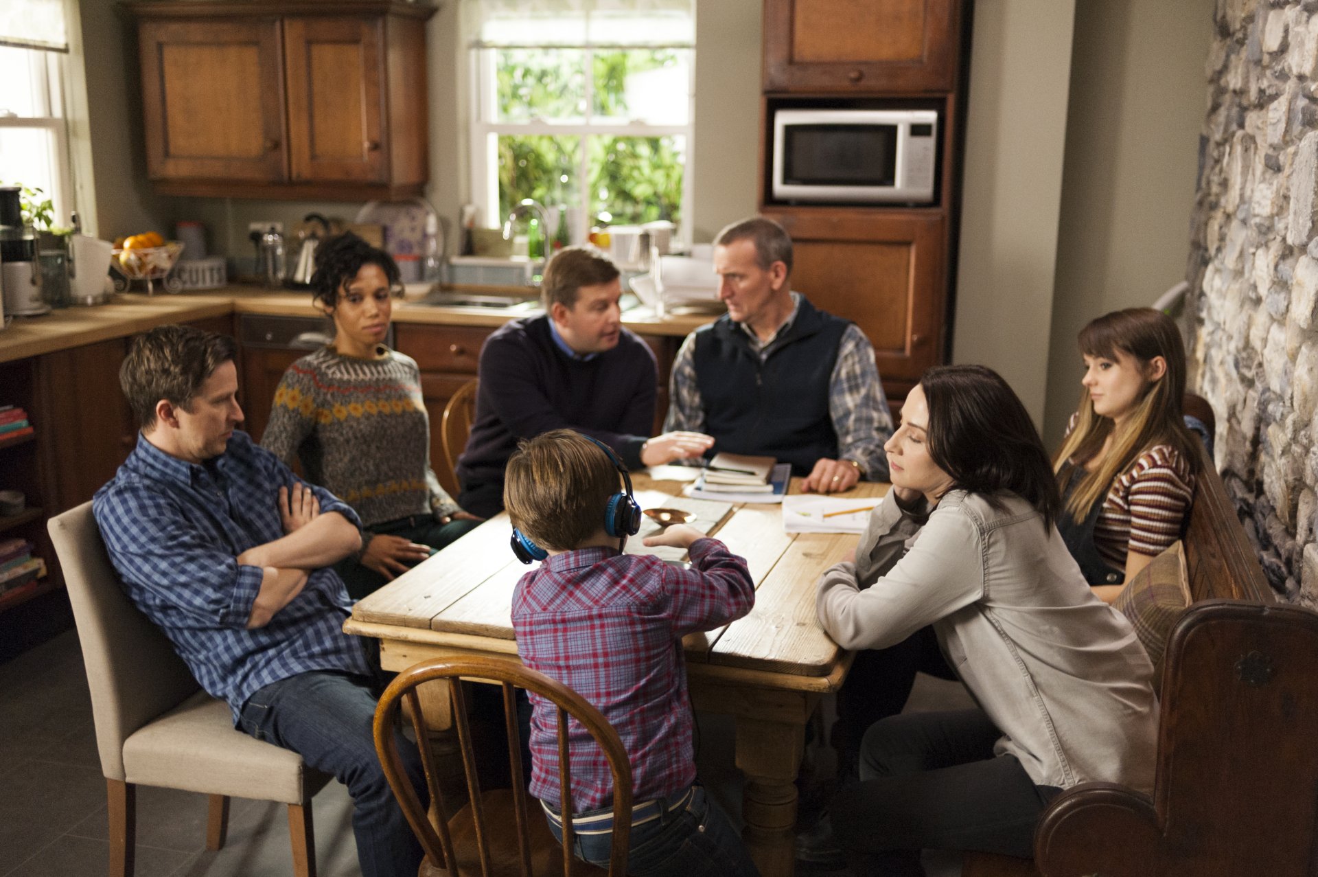 HD desktop wallpaper of 'The A Word' featuring a family scene around a kitchen table.