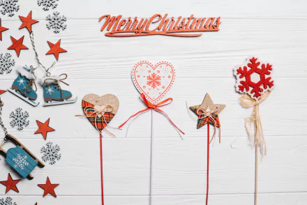 Festive Merry Christmas 4K Ultra HD wallpaper featuring holiday-themed ornaments including stars, snowflakes, hearts, and bells on a white wooden background.