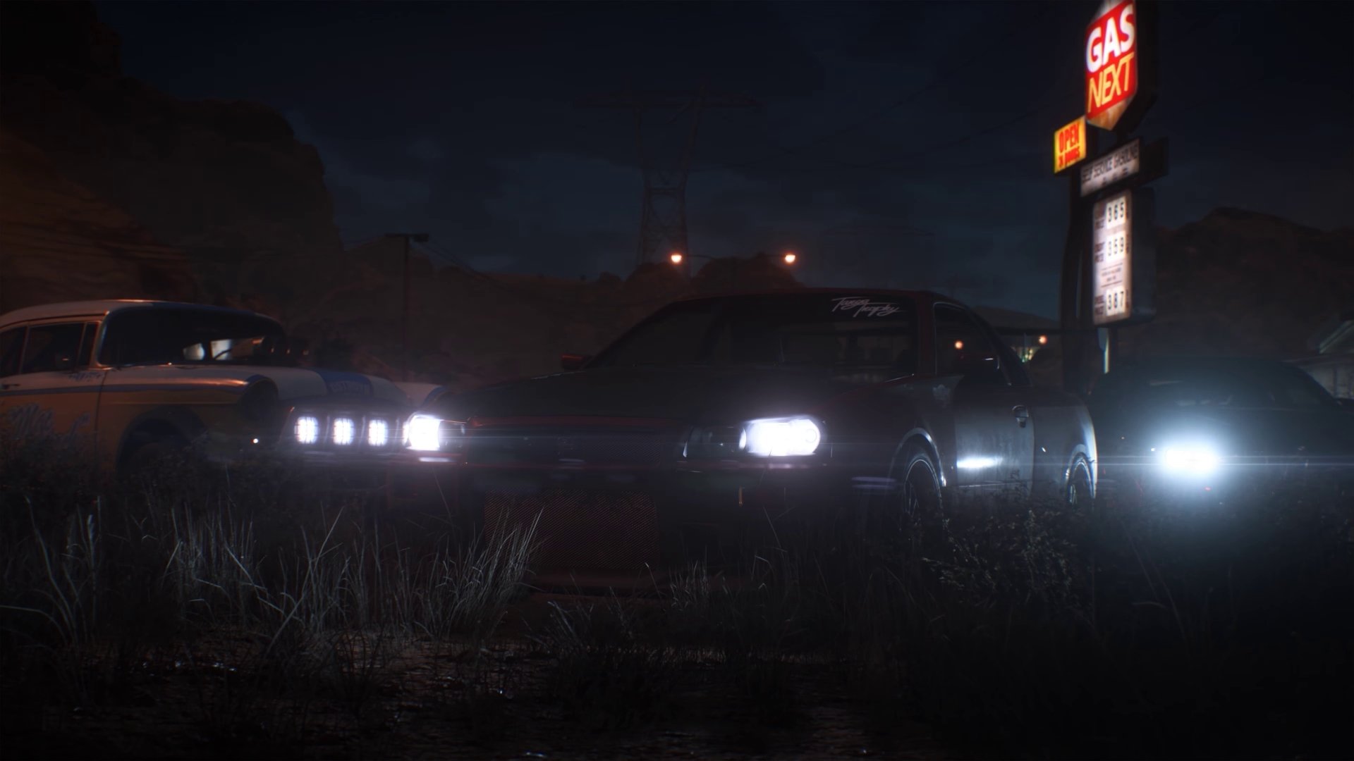 HD PC wallpaper featuring a Nissan Skyline GT-R V-Spec II from Need for Speed Payback, set in a dark, moody environment near a gas station.