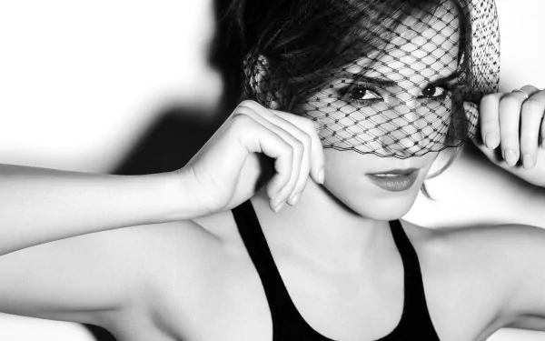 Black and white HD desktop wallpaper of actress Emma Watson wearing a veil, captured in a monochrome, elegant portrait.