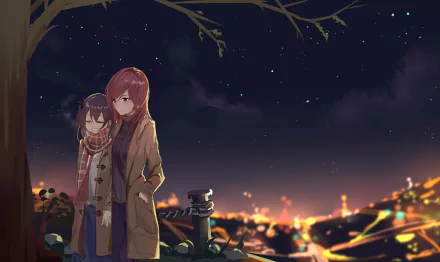 HD wallpaper of Love Live! characters Nico Yazawa and Maki Nishikino standing under a tree at night, city lights glowing behind them.