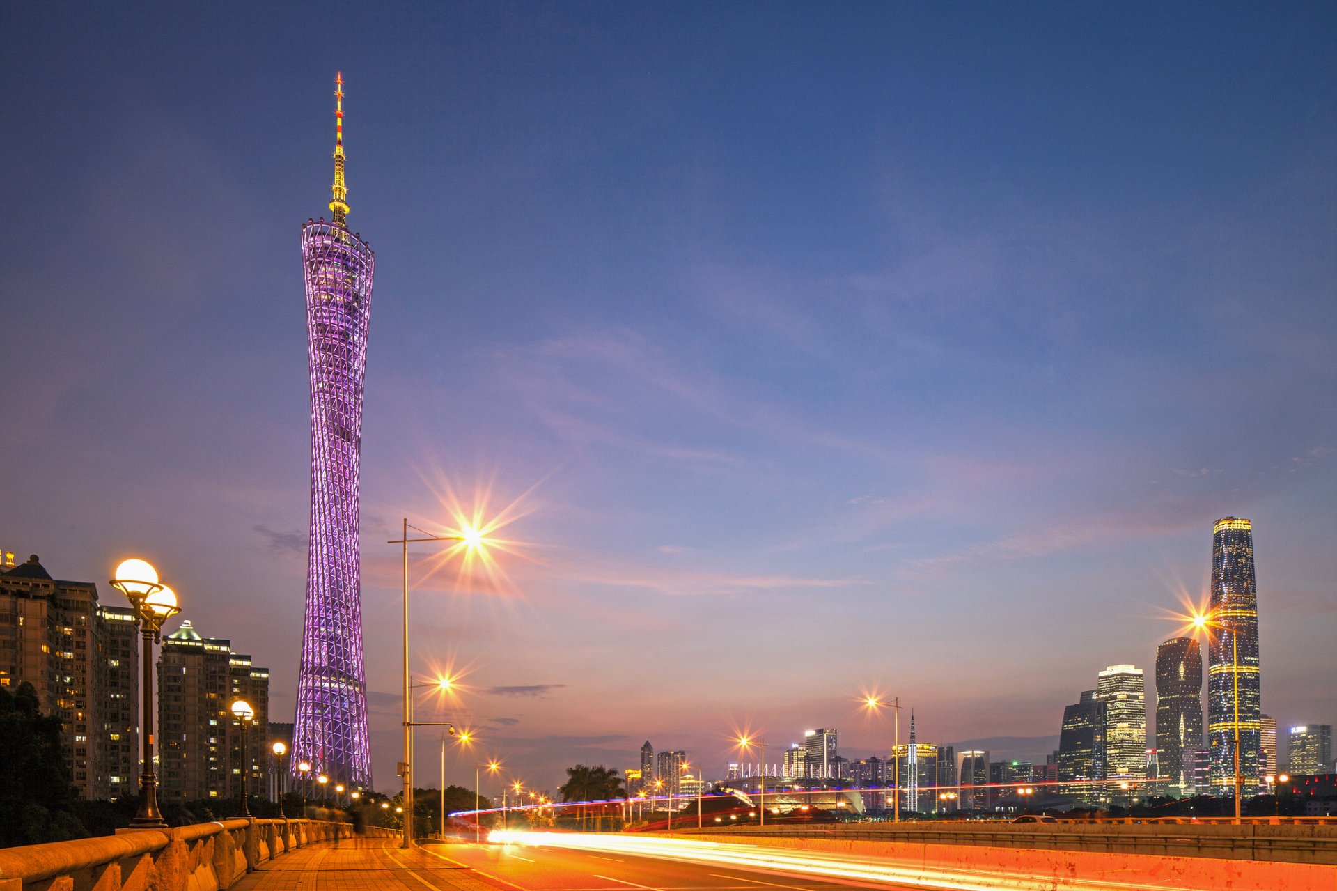 HD wallpaper of Guangzhou featuring the illuminated Canton Tower at dusk, China.