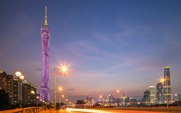 HD wallpaper of Guangzhou featuring the illuminated Canton Tower at dusk, China.