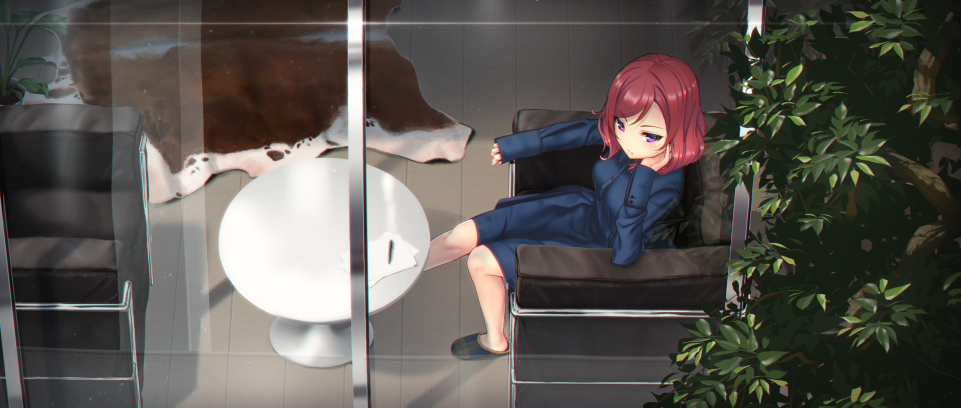 HD PC desktop wallpaper featuring Maki Nishikino from the anime Love Live!, seated thoughtfully on a chair near a table and indoor plants.
