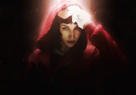 HD desktop wallpaper and background featuring Úrsula Corberó as Tokyo from the TV show Money Heist (La Casa De Papel), showcasing her in a red hooded outfit with an intense expression.