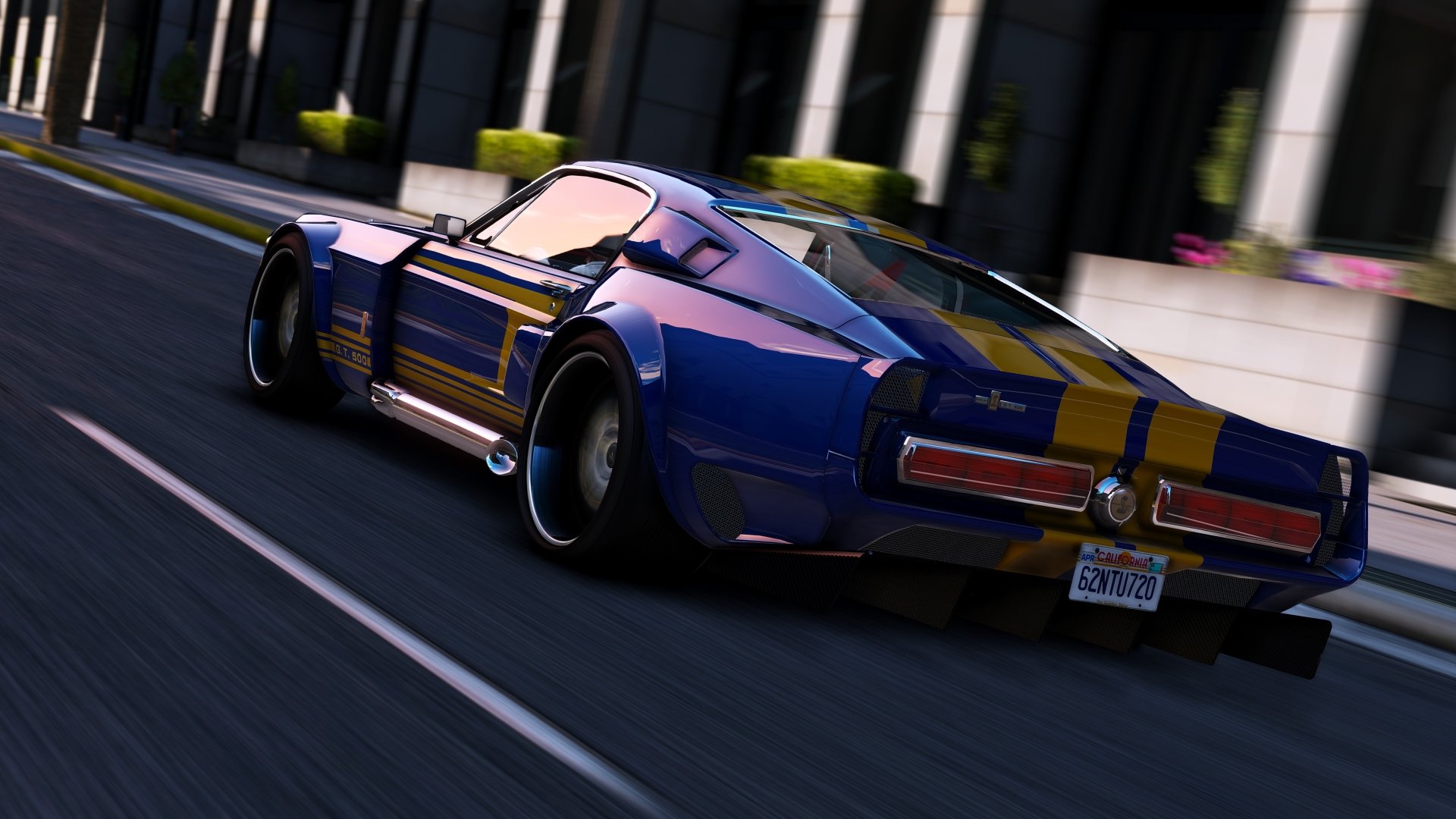 A detailed 4K Ultra HD PC wallpaper of a blue Ford Mustang car from the video game Grand Theft Auto V, captured speeding on a city street.