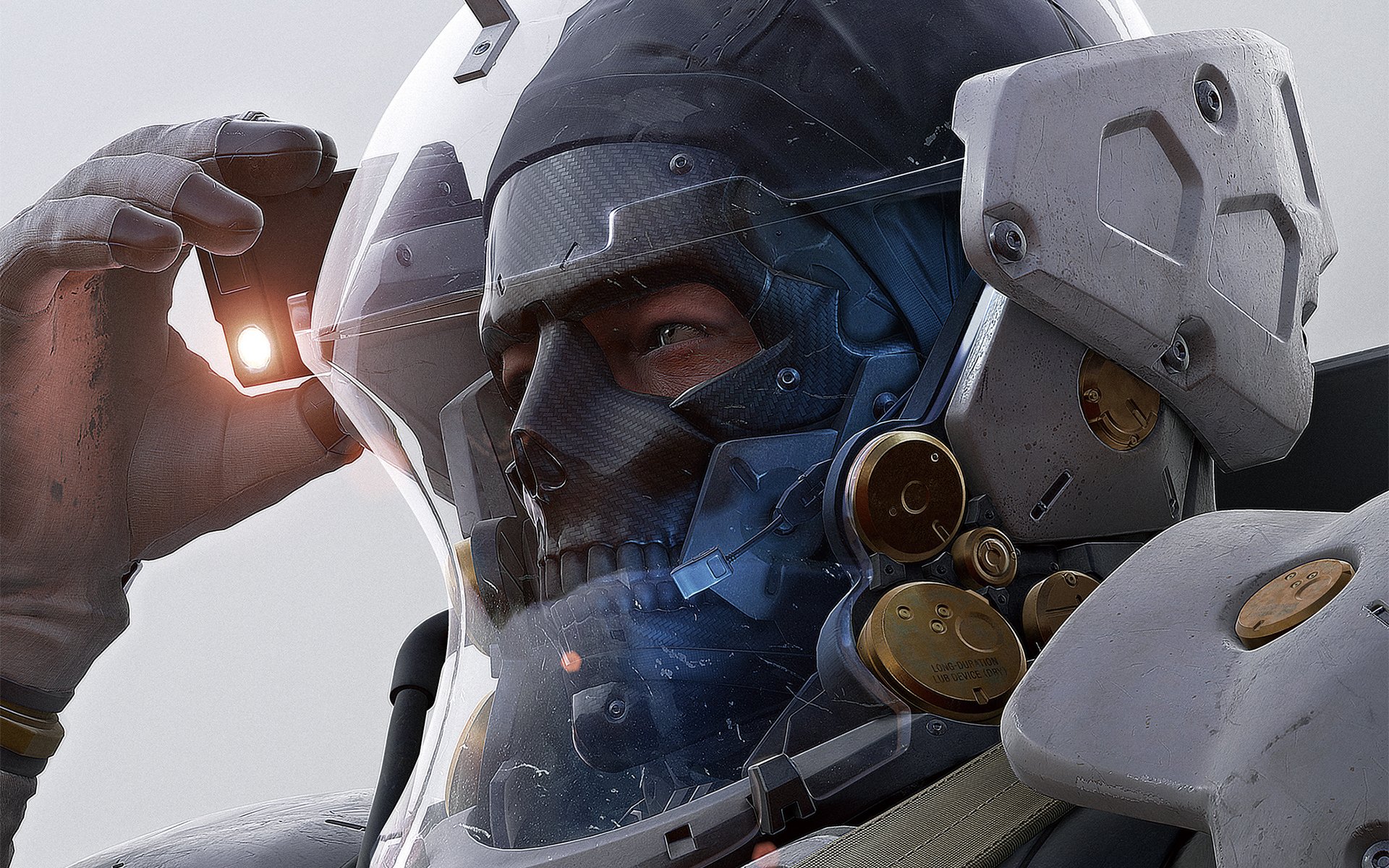 A high-definition desktop wallpaper from the video game Death Stranding, featuring a close-up of a character in futuristic armor and helmet.