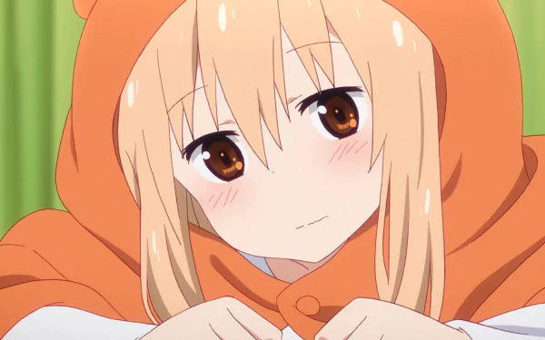 HD desktop wallpaper featuring Umaru Doma from the anime Himouto! Umaru-chan. She is wearing her signature orange hoodie, looking adorable with a gentle expression.