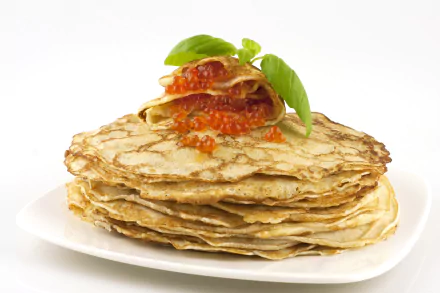 Golden crêpes stacked on a white plate, topped with red caviar and basil — food, 4K Ultra HD PC desktop wallpaper and background.