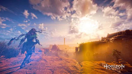 Aloy from Horizon Zero Dawn stands on rocky terrain at sunset, depicted in a vibrant HD PC desktop wallpaper inspired by the Horizon video game series.