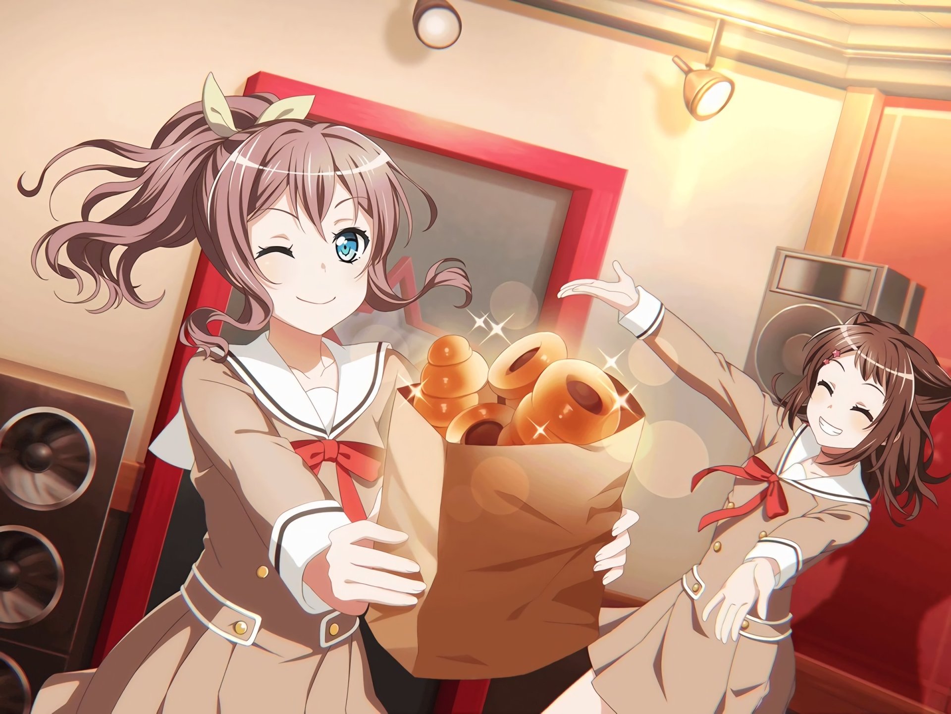 HD anime desktop wallpaper featuring Kasumi Toyama and Saaya Yamabuki from BanG Dream! joyfully holding a bag of bread in a warm, lively setting.