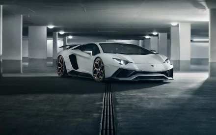 White Lamborghini Aventador S parked in a dimly lit underground garage, captured in a sharp 4K Ultra HD PC desktop wallpaper.