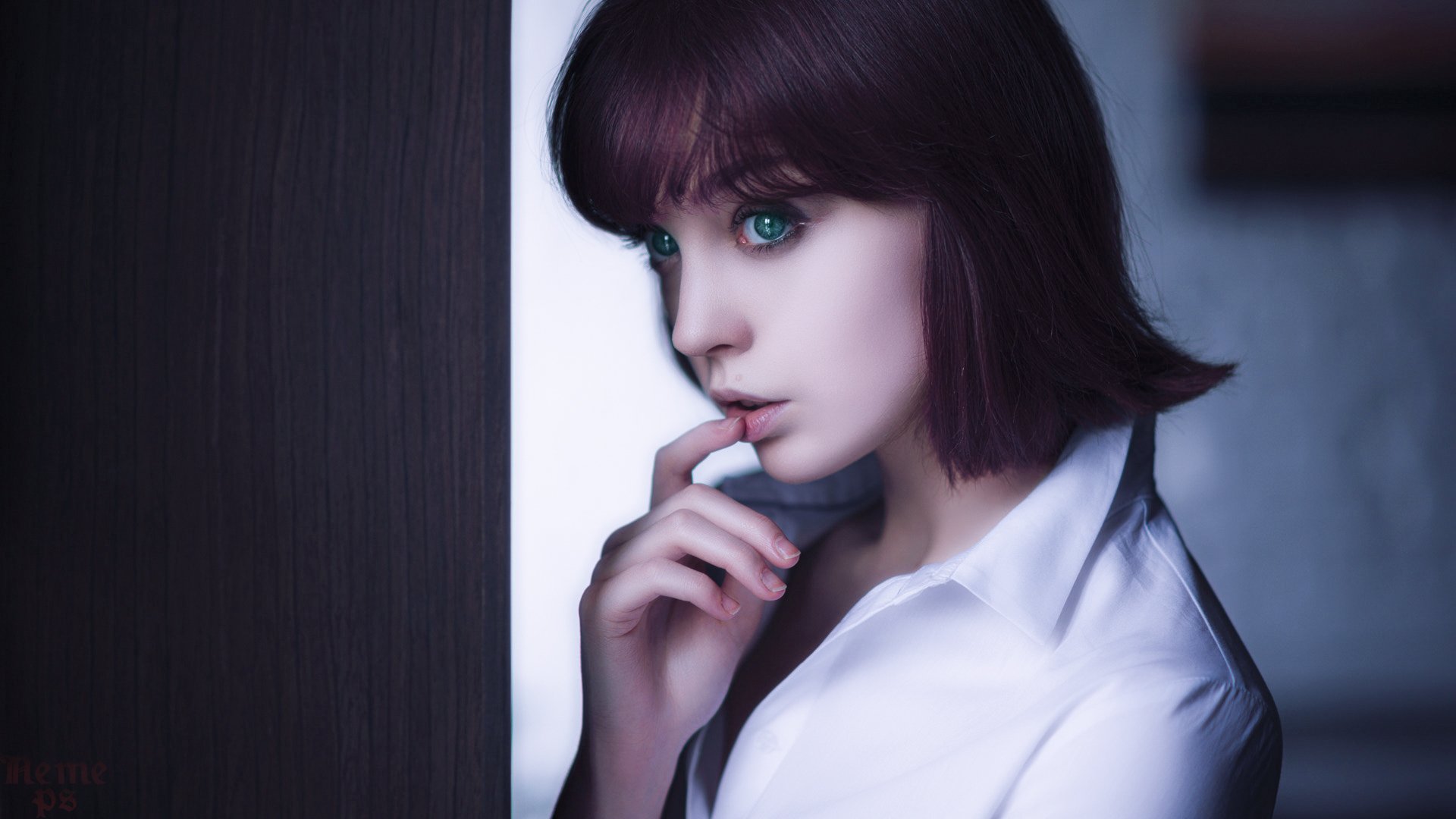 HD PC desktop wallpaper featuring a model woman with striking purple hair and green eyes, captured in a thoughtful pose.