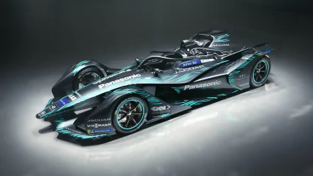 4K Ultra HD desktop wallpaper featuring a sleek Jaguar race car with Panasonic branding, showcasing advanced aerodynamic design and modern racing aesthetics.
