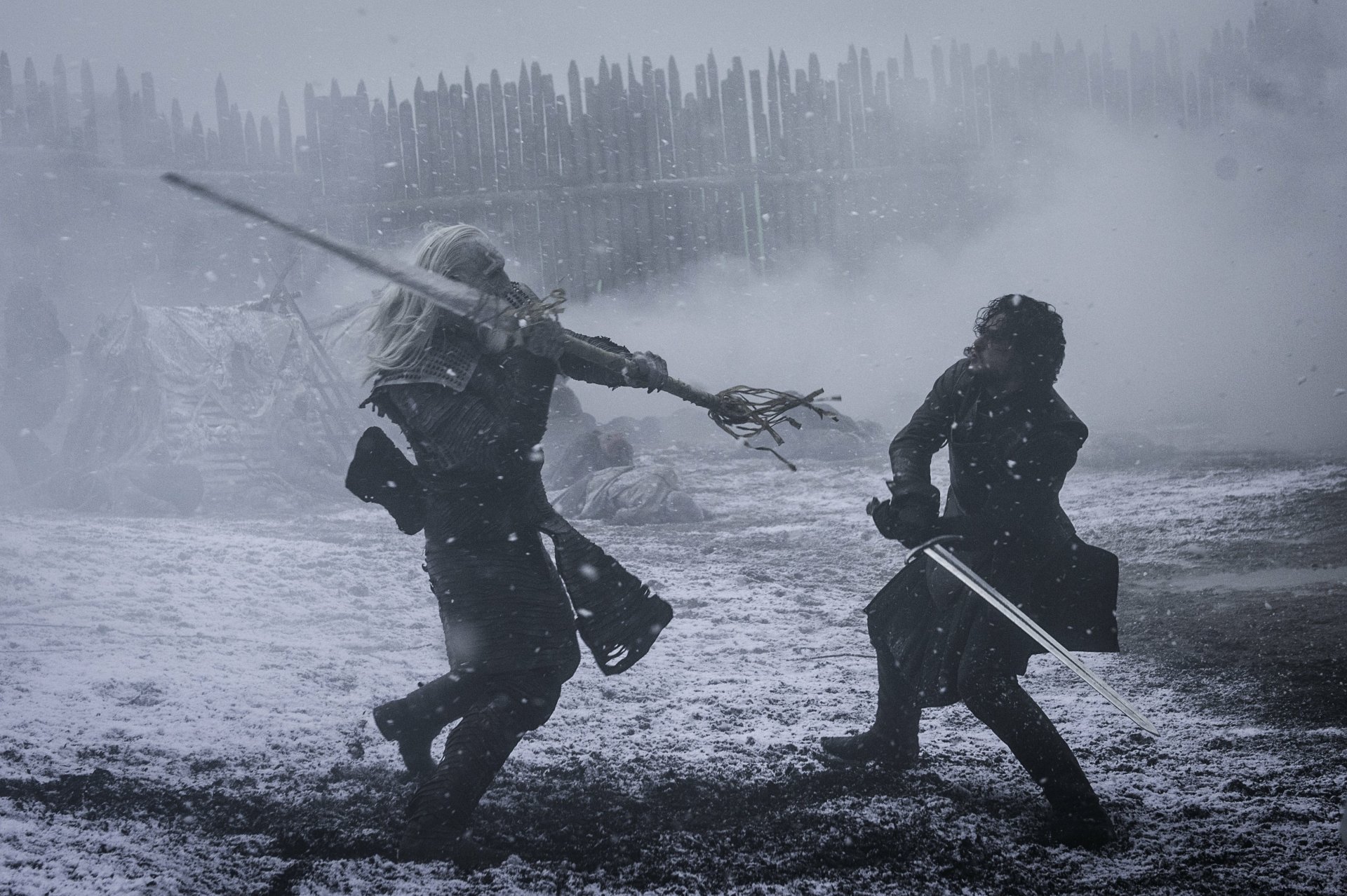 HD desktop wallpaper of Jon Snow battling a white walker in a snowy scene from the TV show Game Of Thrones.