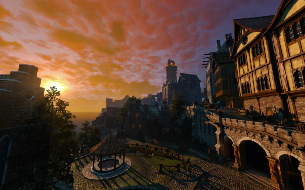 8K Ultra HD desktop wallpaper featuring a detailed sunset scene from The Witcher 3: Wild Hunt video game, showcasing medieval architecture and a vibrant sky.