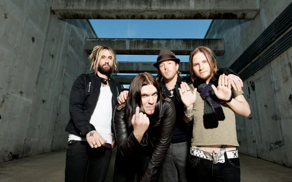 HD desktop wallpaper of Shinedown band members posing outdoors in a raw, urban setting.