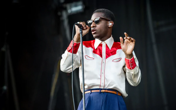 Leon Bridges performing on stage, HD desktop wallpaper and background.