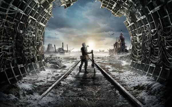 4K Ultra HD Metro Exodus PC desktop wallpaper featuring a lone figure standing on snowy train tracks, framed by a broken tunnel opening in a post-apocalyptic landscape.