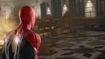 Spider-Man (PS4) video game scene: Spider-Man in red-and-black suit surveys a wrecked interior, 4K Ultra HD PC desktop wallpaper.