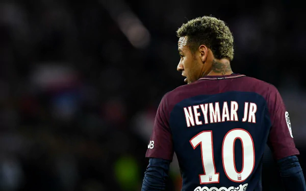 HD desktop wallpaper featuring Brazilian soccer star Neymar Jr. wearing his number 10 jersey on the field during a match.