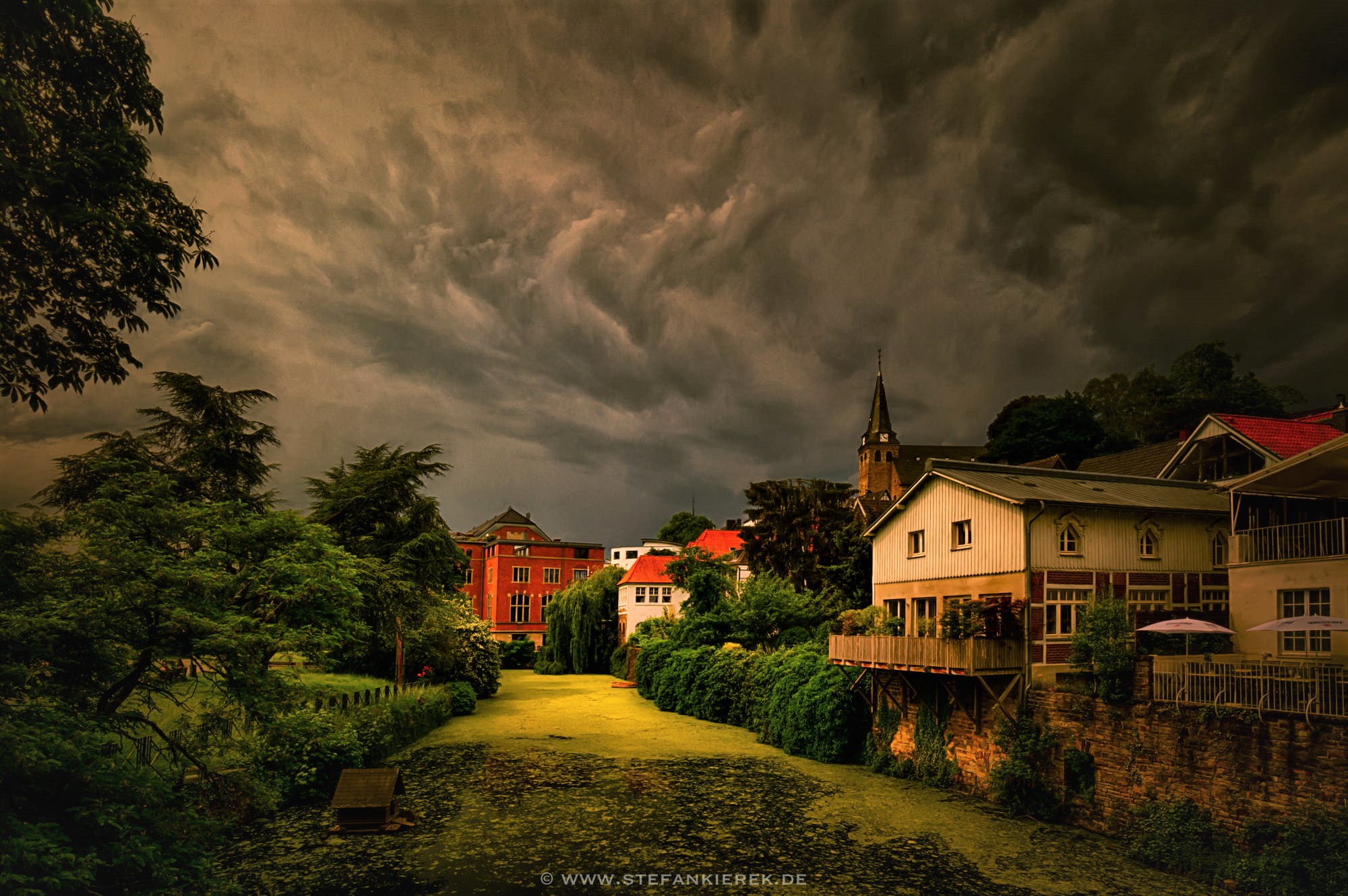 Heavy Clouds over Village by Stefan Kierek