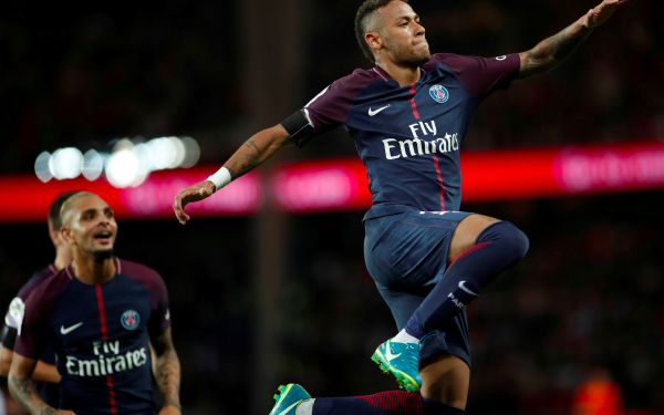 HD desktop wallpaper featuring Neymar in action on the soccer field, wearing Paris Saint-Germain gear.