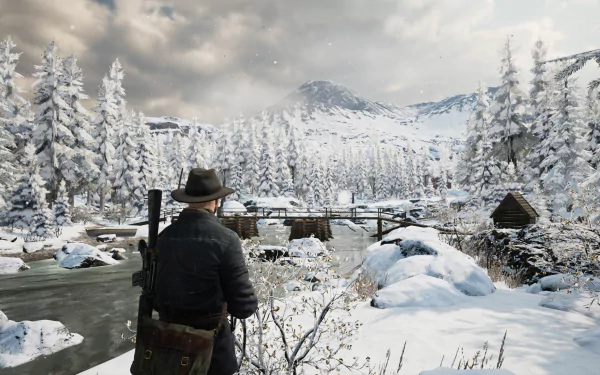 HD desktop wallpaper of a person overlooking a snowy landscape with trees and mountains, exuding a sense of vigor.