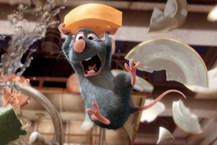 Remy from Ratatouille, holding cheese, joyfully suspended mid-air with kitchenware around, in an HD desktop wallpaper and background.